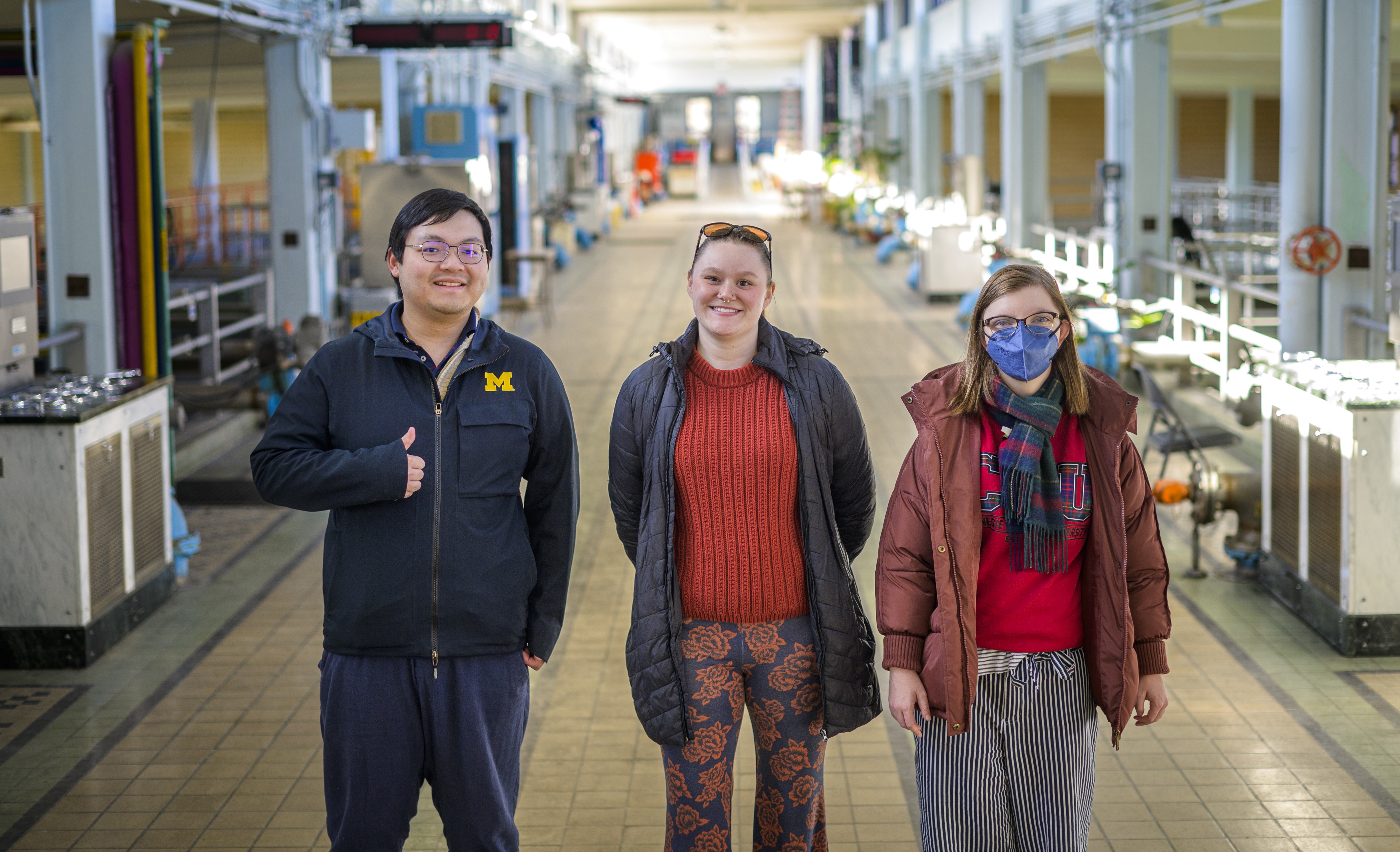 Master of Science in Information students Carl Fan, Lindsey Dye and Kendall Scarborough  pose during a tour of the Ann Arbor Water Treatment Plant.