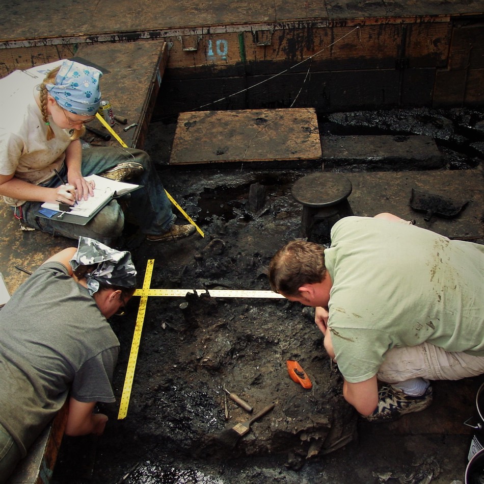 Andrea Thomer and two other people working at a tar pit