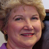 A headshot of Elaine Didier