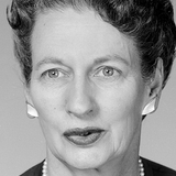 A black and white headshot of Martha Boaz