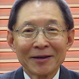 A headshot of Paul Poon