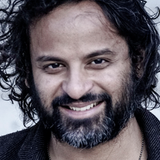 A headshot of Sameer Halai
