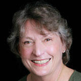 A headshot of Anne Beaubien