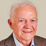 A headshot of John Cameron