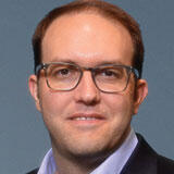 A headshot of Kyle Cozad