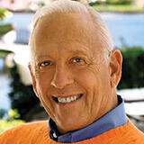 A headshot of John Evans