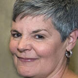 A headshot of Kenlee Ray