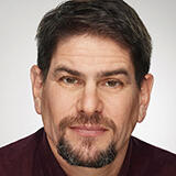 A headshot of Ian Rosen