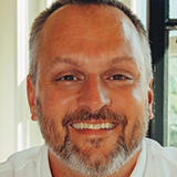 A headshot of Jamie Voris