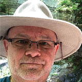 A headshot of Thomas Wilson