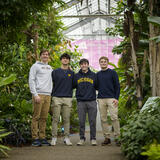 A photo of a SO-ELL program team standing inside the Matthaei Bottanical Gardens conservatory.