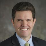 A headshot of Steve Tuohy