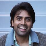 A headshot of RJ Jain
