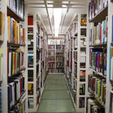Rows of bookshelves in a library.