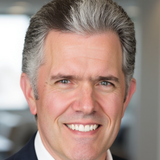 A headshot of Steve Tuohy