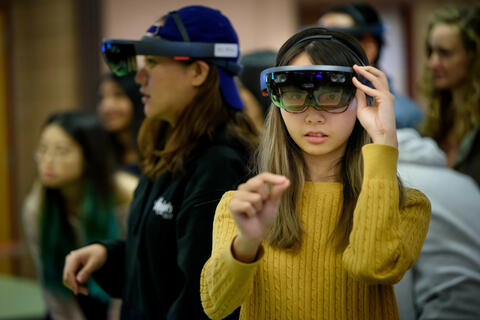 girl using VR glasses