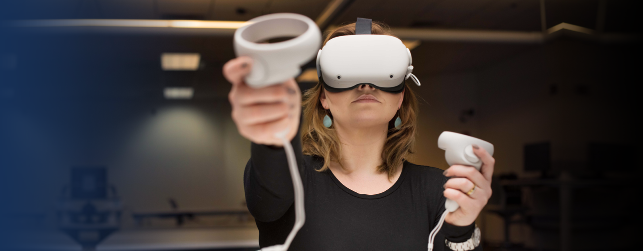 Chloe Preble using a VR headset