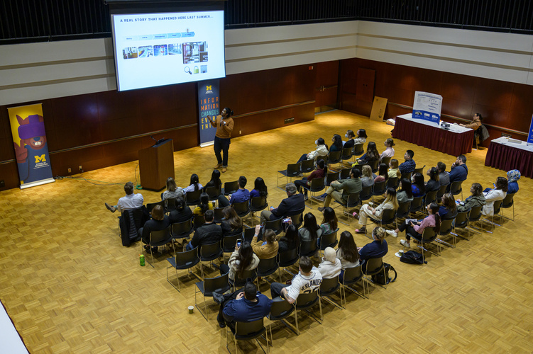 people gather in an event space