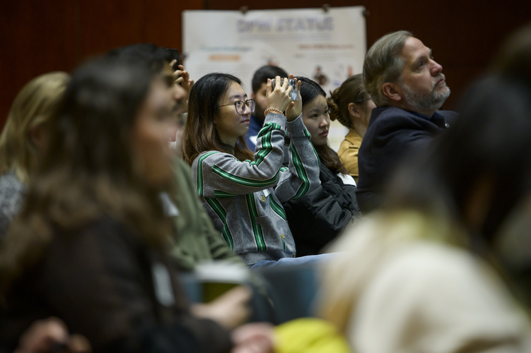 people gather in an event space
