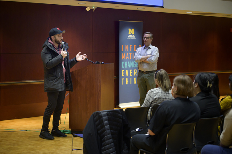 people gather in an event space