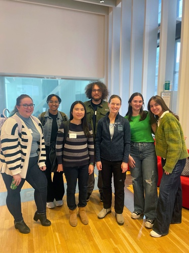 A group photo of Kolbe Sussman, Neha Nair, Gretchen Lam, Justin Villa, Susan Bryan, Charlotte Parent and Valeria Fraga