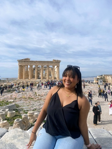 Yessenia Santana-Perez poses in front of the Acropolis of Athens