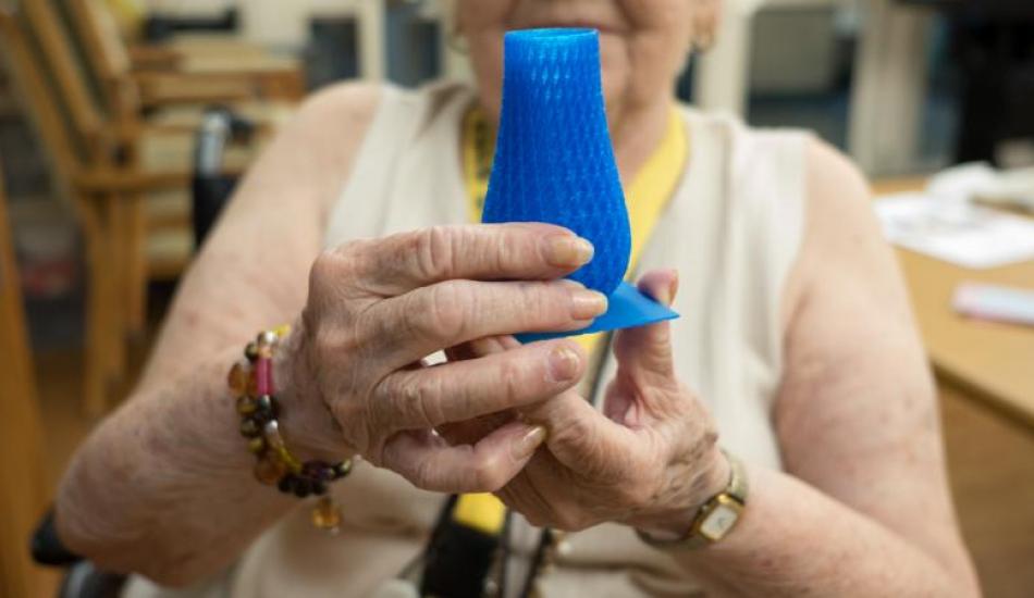 GiGi holding a 3D printed vase