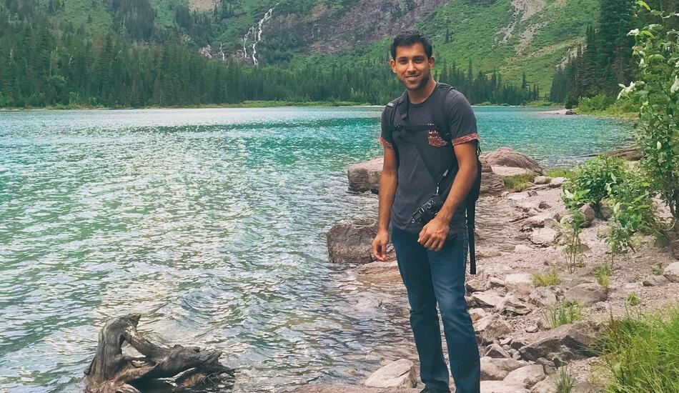 Ani Madurkar standing by river