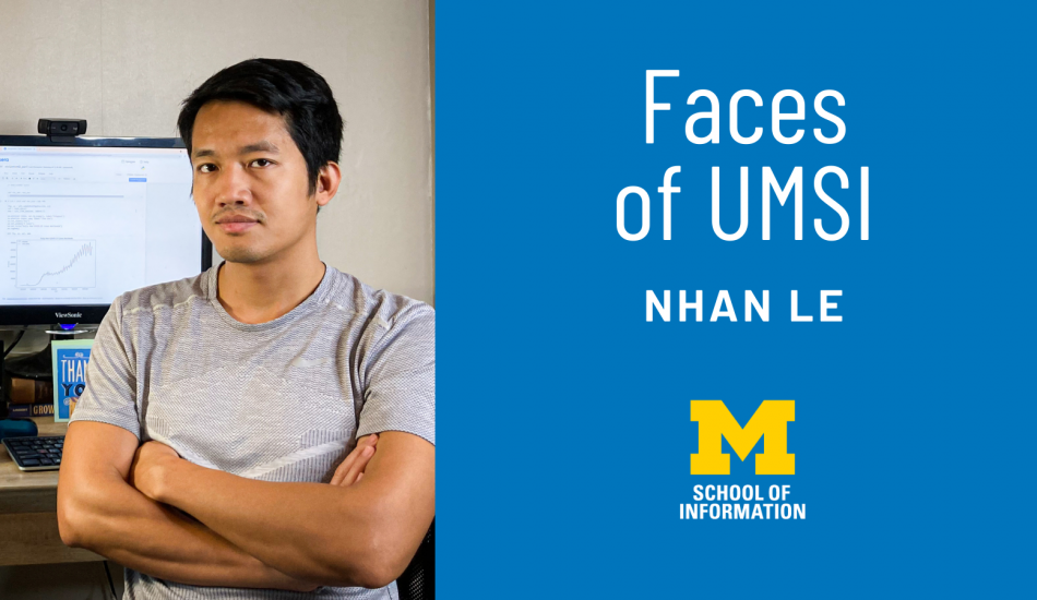 Nhan Le in front of a desktop computer. "Faces of UMSI: Nhan Le"