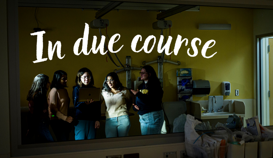 A photo of five students reflected in a mirror in the Clinical Simulation Center at U-M, with the text "In due course" 