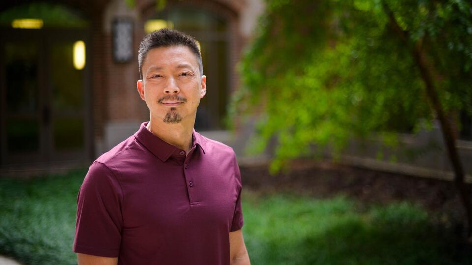 Jeff Sheng poses in the North Quad courtyard