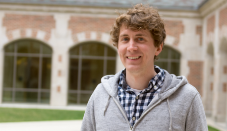 Aaron Kosel smiling outside of North Quad