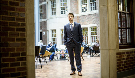 Brendan Palkowski standing in the Michigan Union