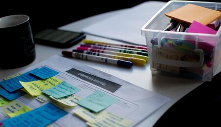 Table with a calendar and pens