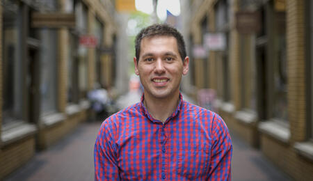 A headshot of Stephen Ontko in the Arcade in Ann Arbor