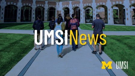 UMSI News. Students walking towards a building on UM's campus. 