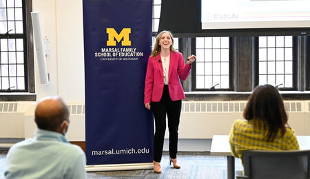 A photo of Jessica Browning presenting her platform, KidsAI, at the Learning Lever competition