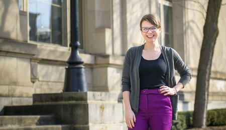Rachael Zuppke poses in front of an academic building on campus.