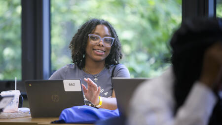 Rising high school senior Brooklynn Huntzer participates in a class discussion about free speech.