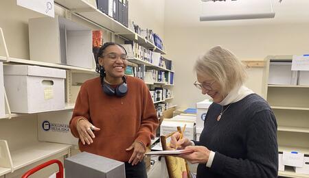 Jordan Rhym (MSI '25) collaborates with professor Elizabeth Yakel during their archives blitz. (Photo by Nadiri Saunders)