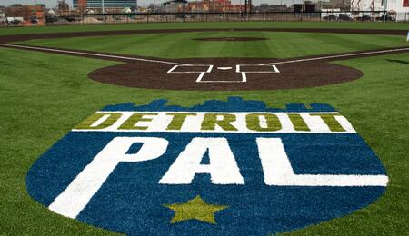 the Detroit PAL logo on a baseball field
