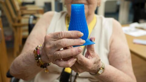 GiGi holding a 3D printed vase