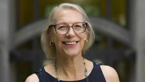 Elizabeth Yakel stands in the NQ courtyard