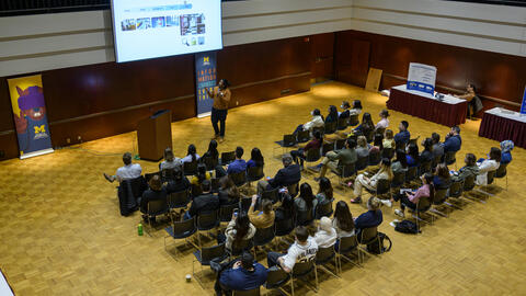 people gather in an event space