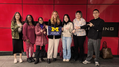 A team of UMSI students poses with their community partner, Dress for Success, in Washington, D.C.