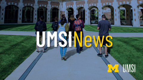 UMSI News. Students walking towards a building on UM's campus. 