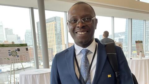 Jean Applys Cherizol poses at the 2024 MIT Sloan Sports Analytics Conference