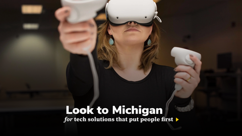 A person wearing a VR headset. Look to Michigan for tech solutions that put people first 