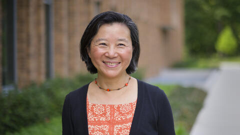 Yan Chen posing outside on the U-M north campus.