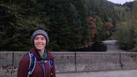 Brooke Hawkins hiking on a trail